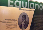 A photo of the Wedgewood supplicant slave on a museum information panel