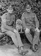 An old photo soldiers sitting with their pet dog