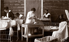 Medical assistants bathing infants in Children's Asylum in the City of Arkhangel'sk, 1915. Courtesy of Michael Zolotarev Collection, Moscow
