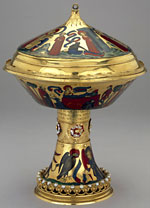 A photograph of a gold cup